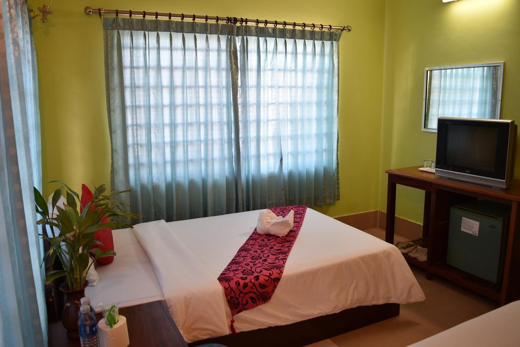 Ta Som Guesthouse & Tour Services Siem Reap Rom bilde