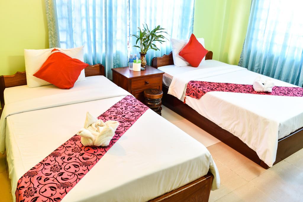 Ta Som Guesthouse & Tour Services Siem Reap Rom bilde
